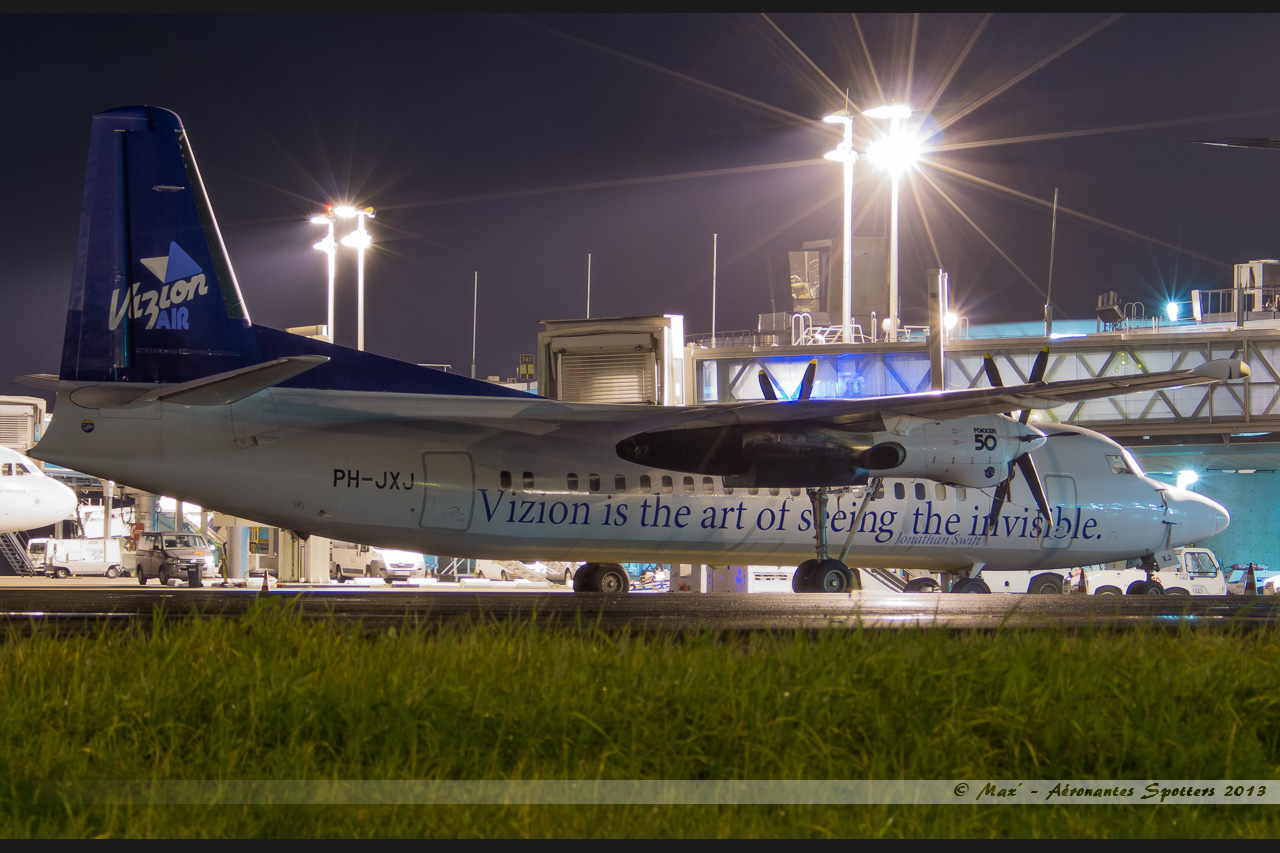 [23/01/2013] Fokker 50 (PH-JXJ) Denim Airways: "Vizion is the art of seeing the invisible" c/s     13012302331315922510790027