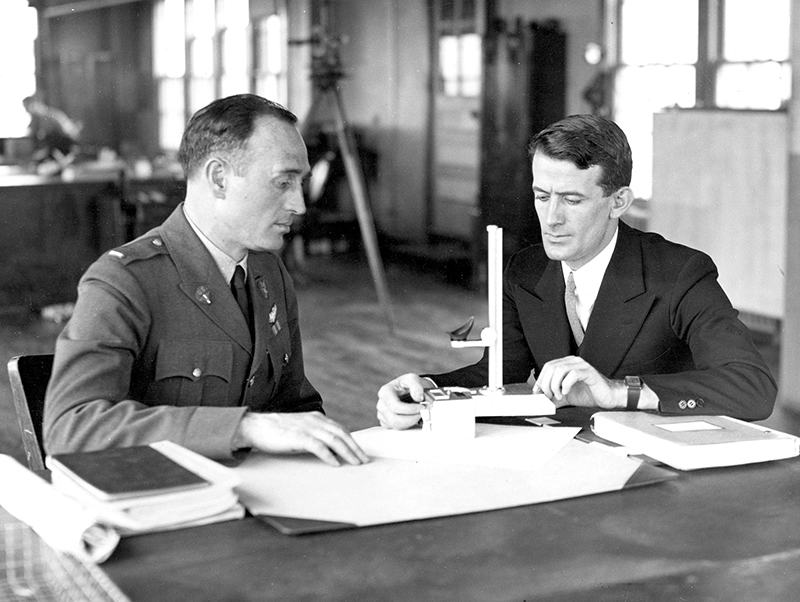 yeager_and_gatty_discussing_drift_meter_-_feb_5_1932 small